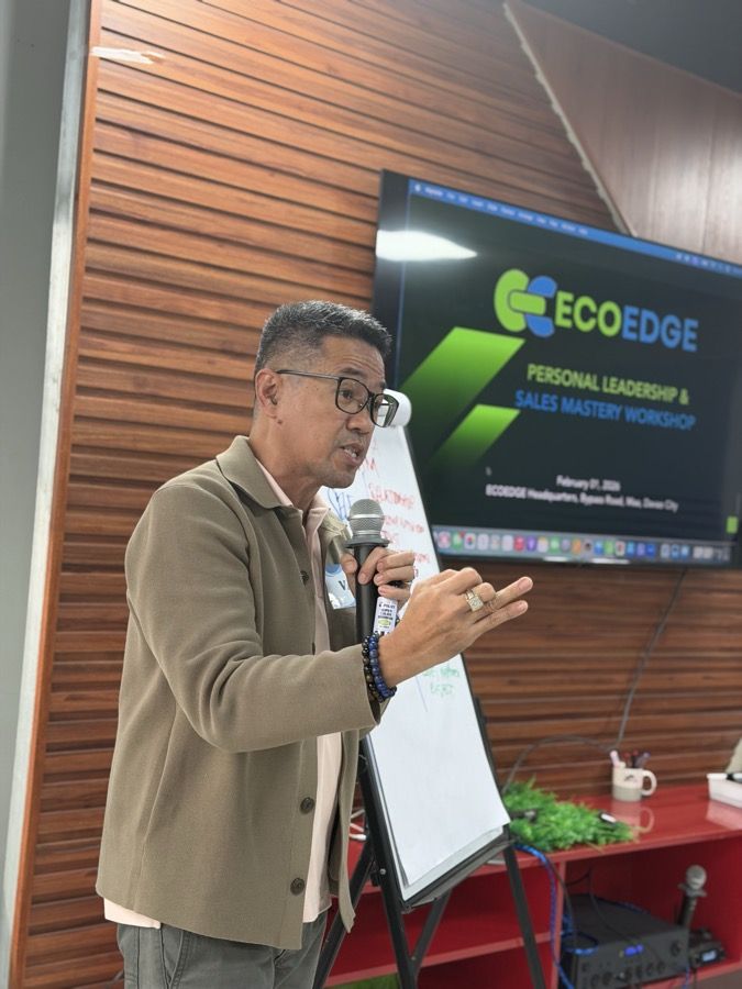 A coach presenting a personal-leadership workshop