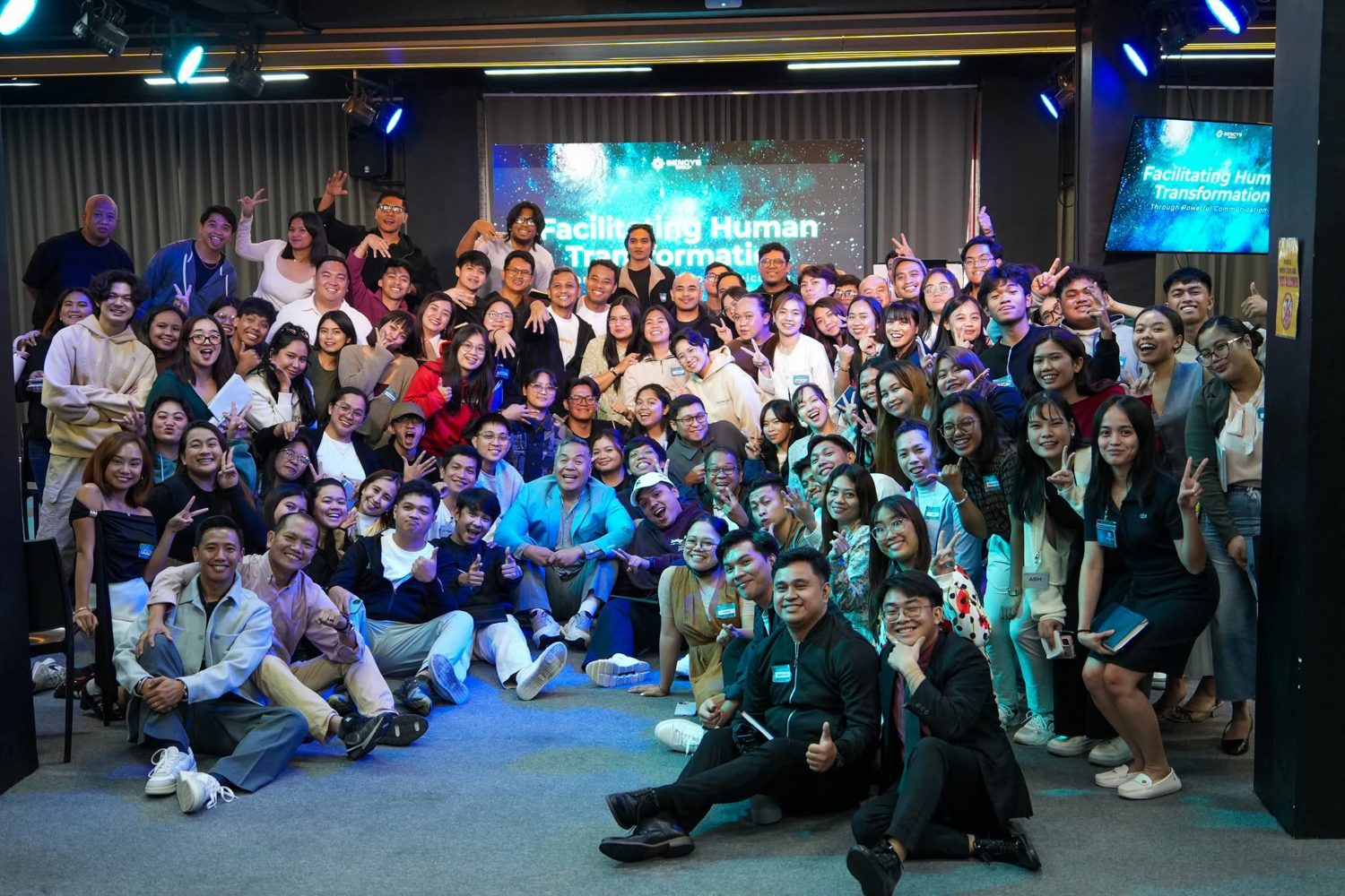 A full room of participants at a SoulSync human-transformation session